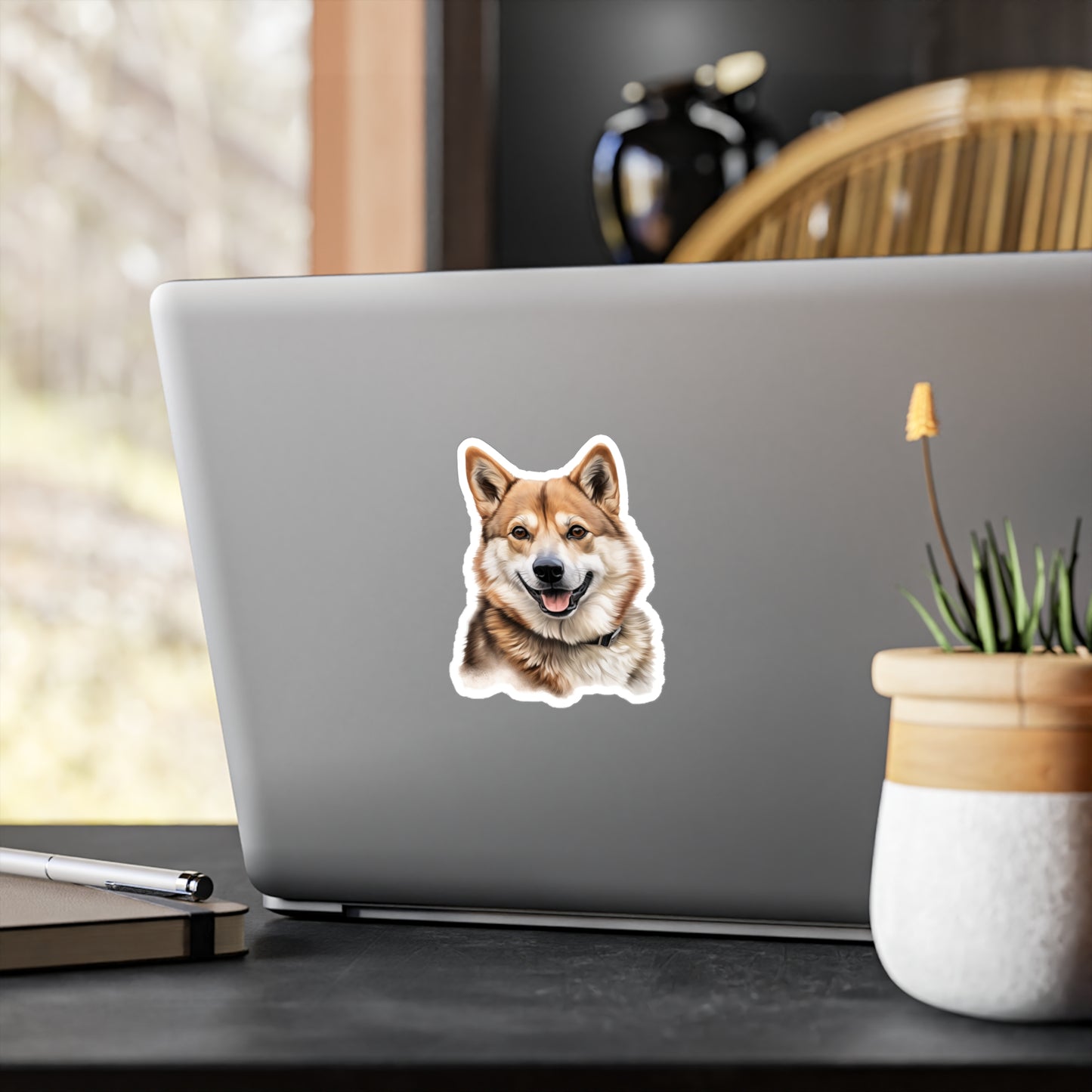 akita sticker on laptop