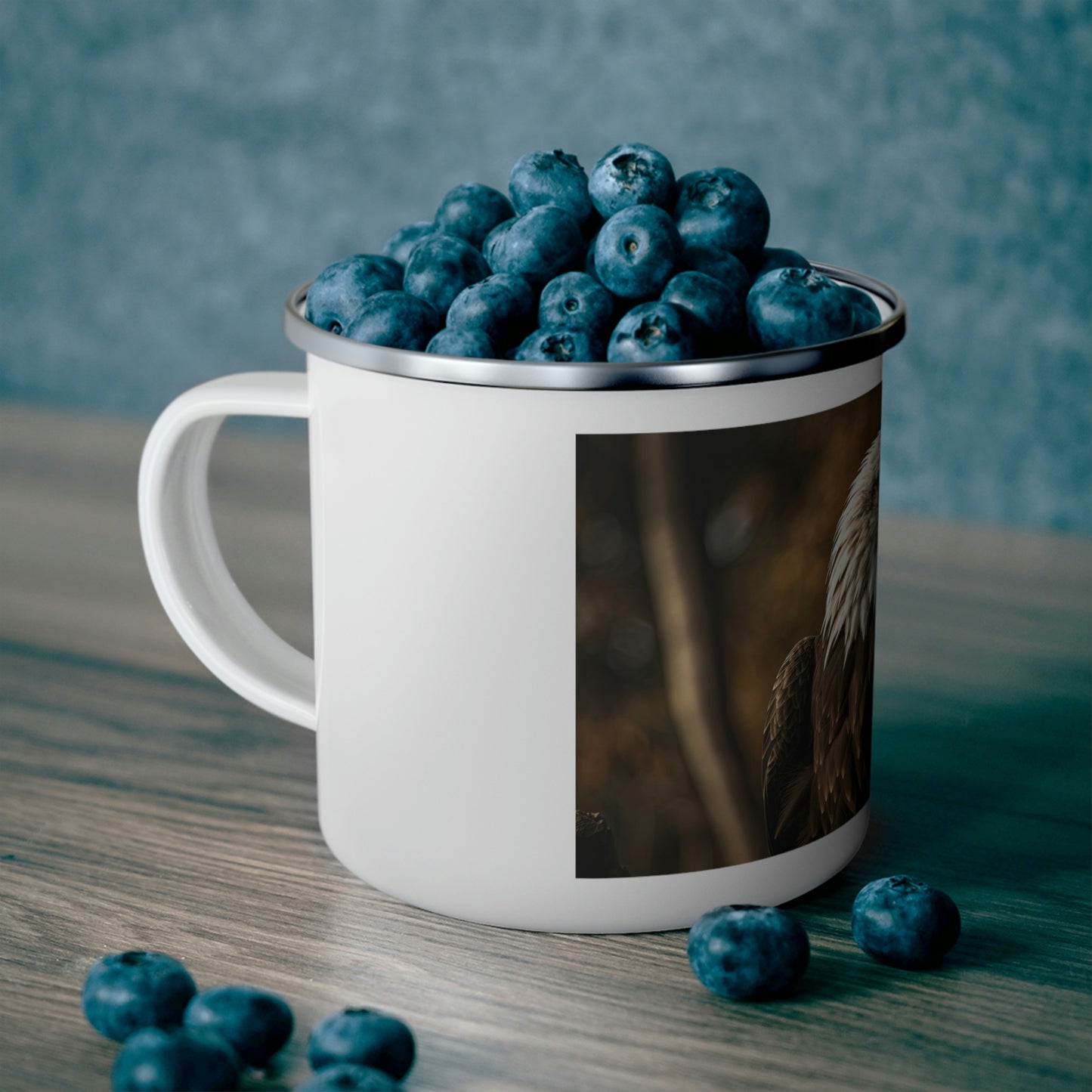 american eagle camping mug filled with blueberries