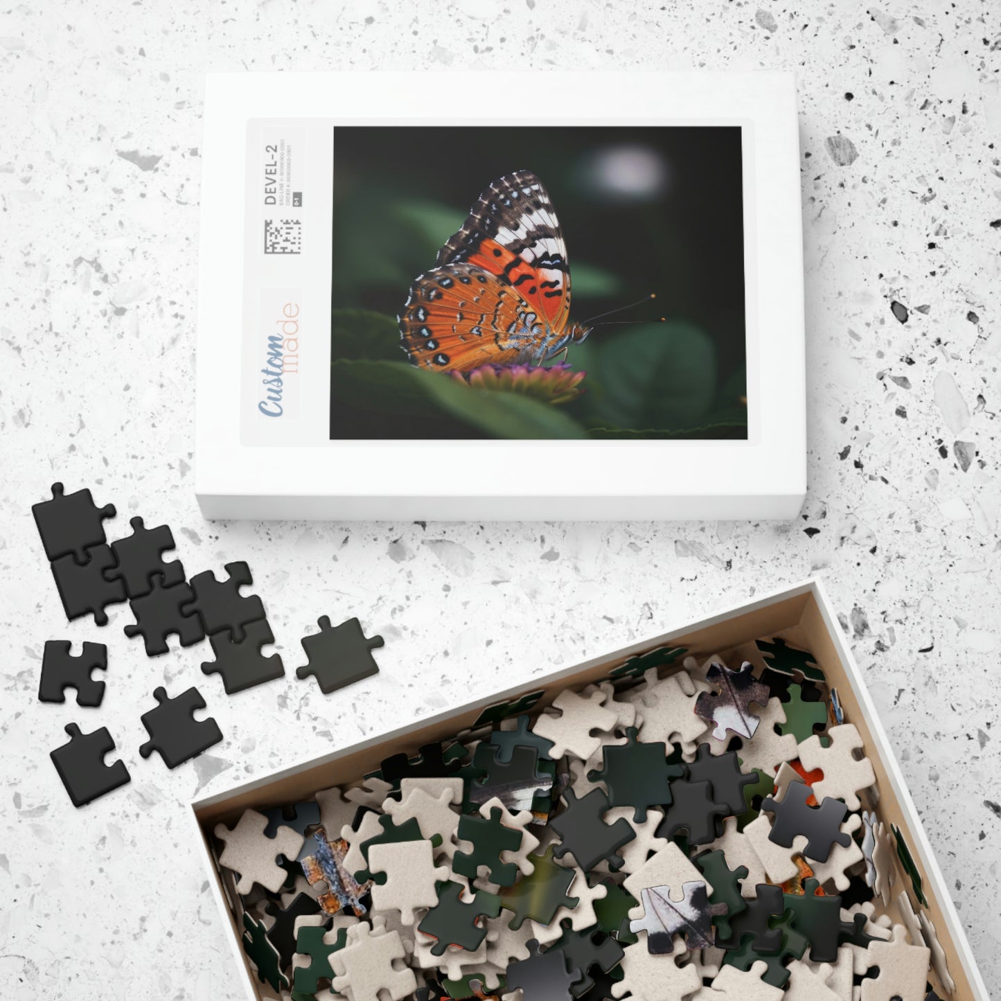 butterfly jigsaw puzzle pieces and box