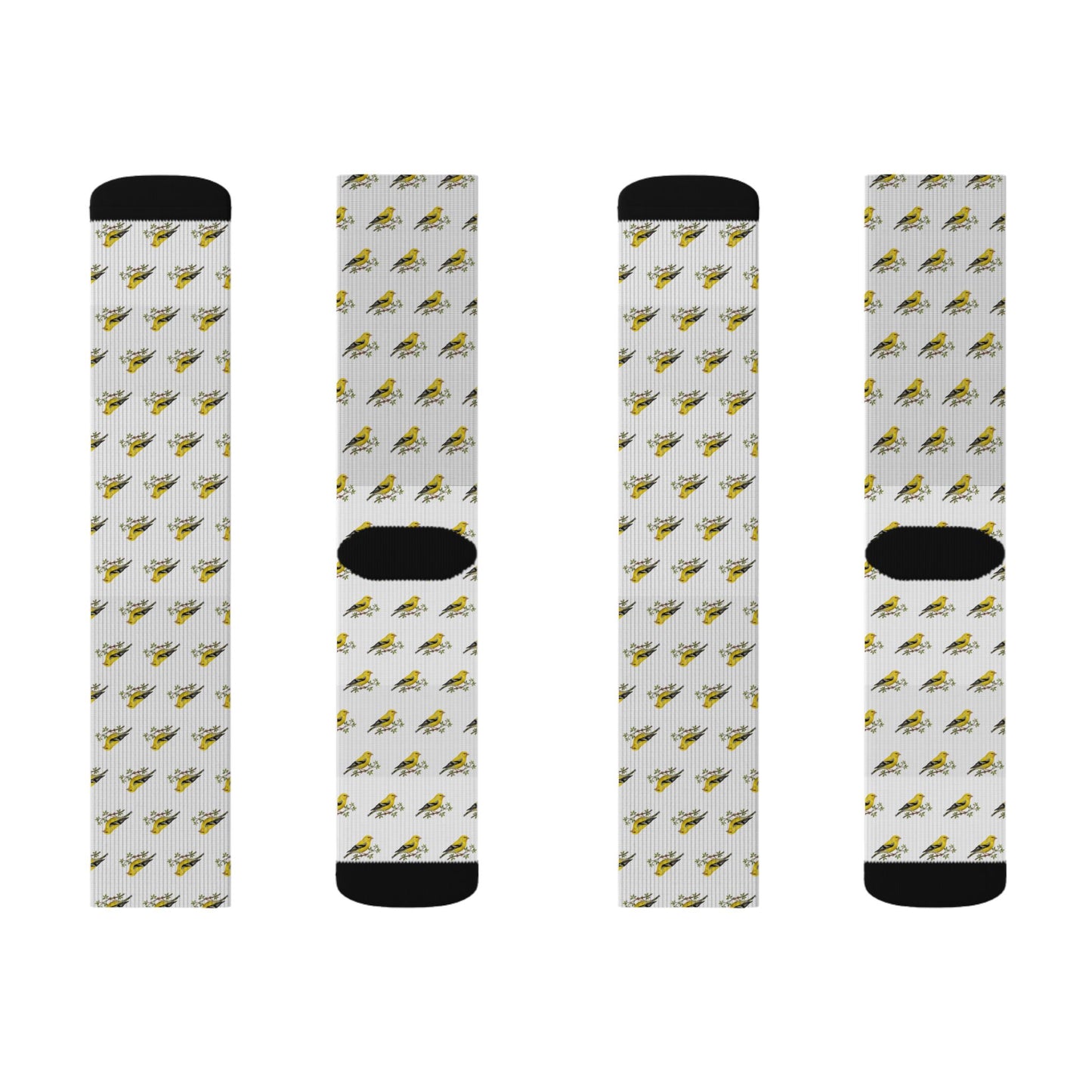 Four socks with a pattern of small yellow birds on a white background
