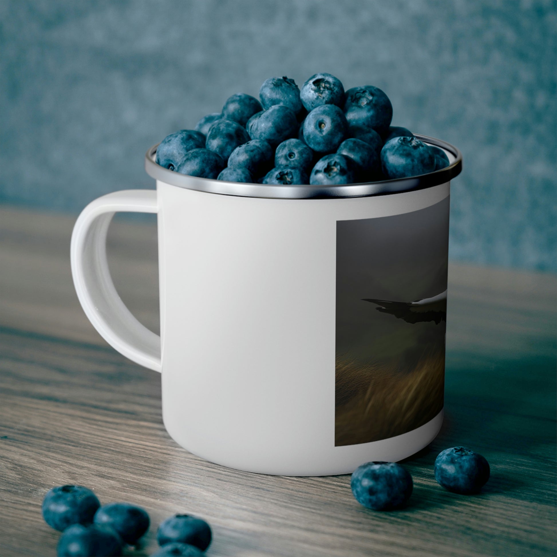 camping mug filled wth blueberries