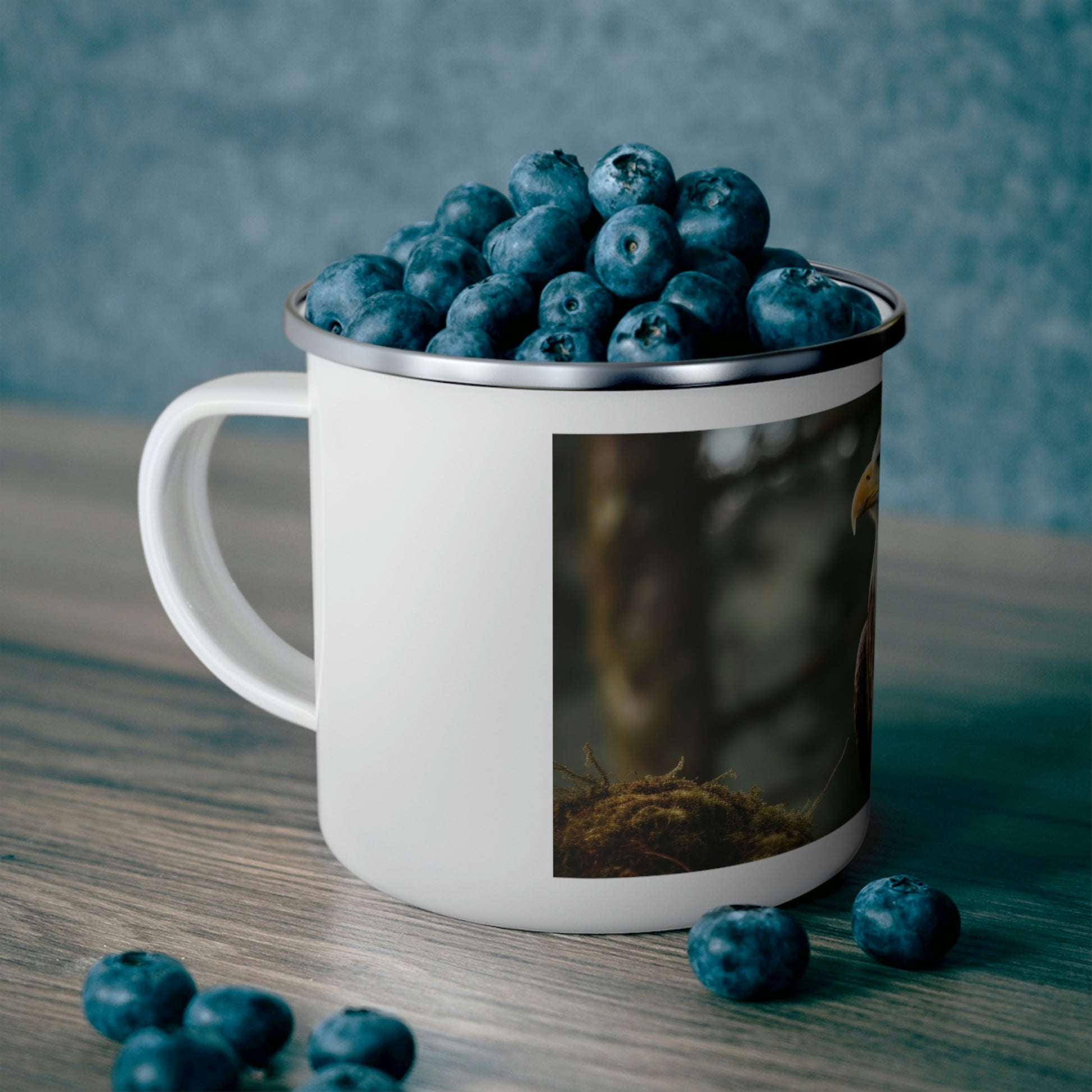eagle camping mug filled with blueberries